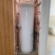 Panasonic air source heat pump cylinder installed in tight airing cupboard, Diss, Norfolk