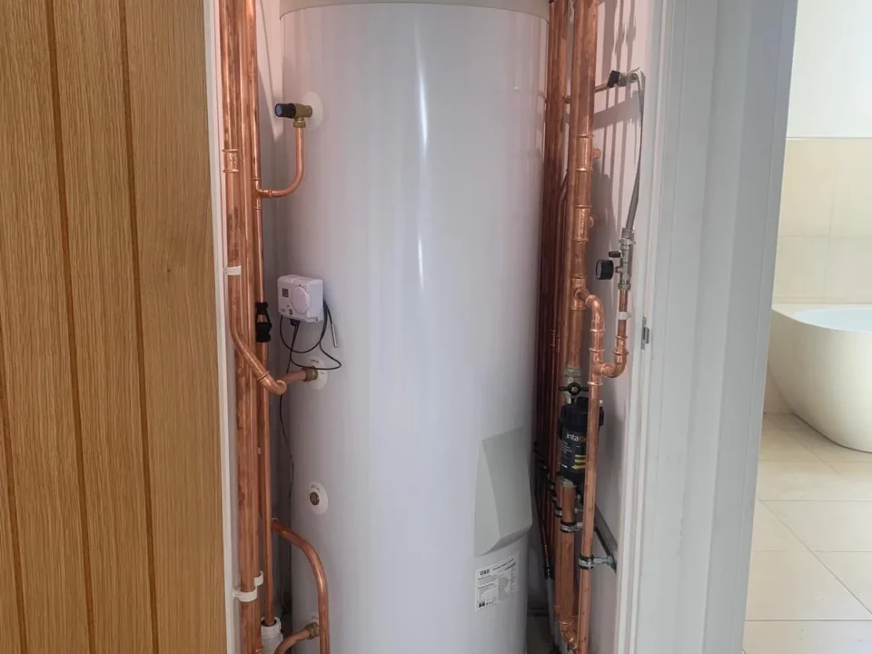 Panasonic air source heat pump cylinder installed in tight airing cupboard, Diss, Norfolk