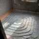 Underfloor heating pipes installed in spiral pattern in Great Moulton bungalow