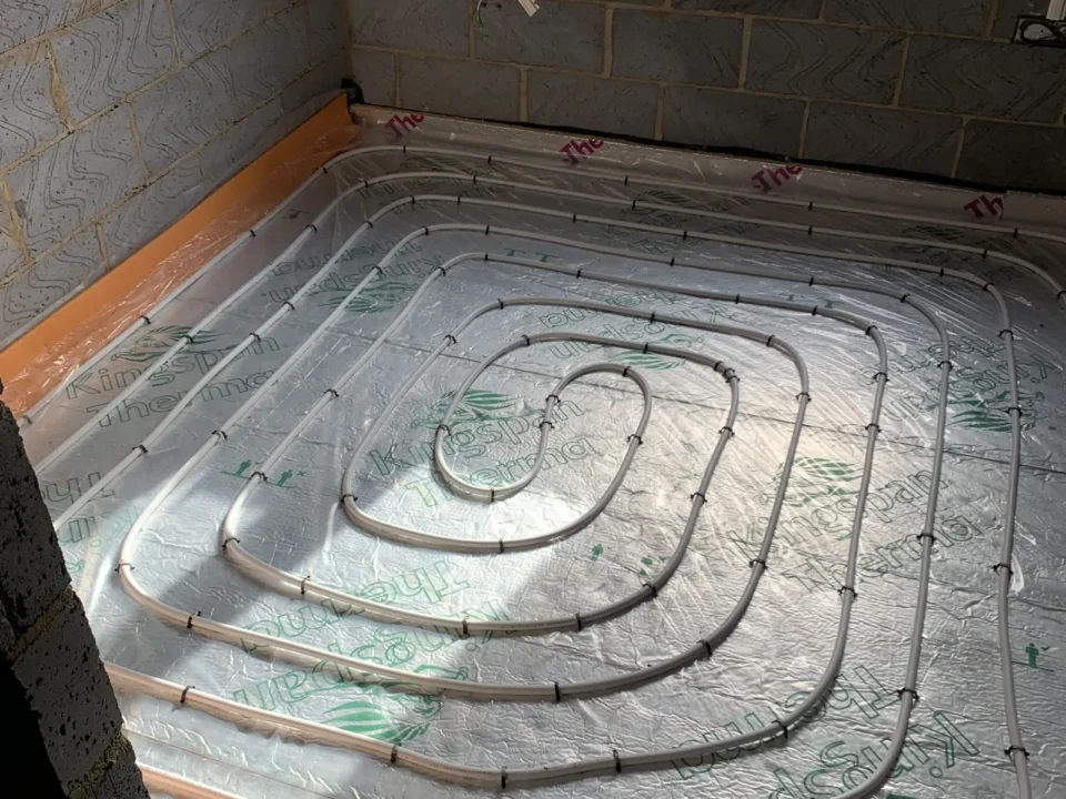 Underfloor heating pipes installed in spiral pattern in Great Moulton bungalow