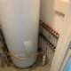 Completed Panasonic Aquarea heat pump cylinder cupboard pipework in Wymondham new build