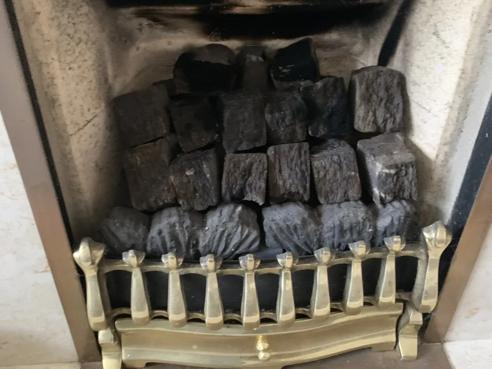 Gas fire in Wymondham showing heavy sooting caused by blocked air vent
