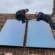 EPH Services engineers installing solar thermal panels on roof in Castle Acre Norfolk