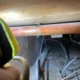Central heating pipe leak repair in Norwich showing punctured copper pipe