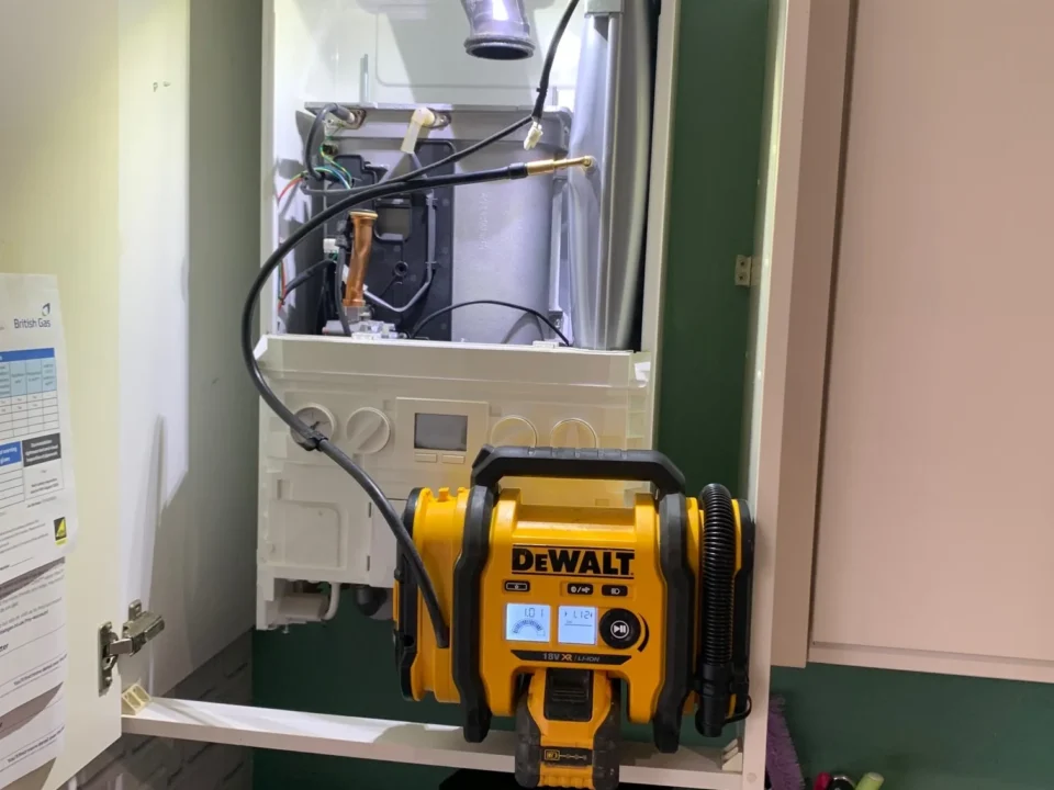 Ideal Logic combi boiler service Attleborough Norfolk with DeWalt vacuum equipment