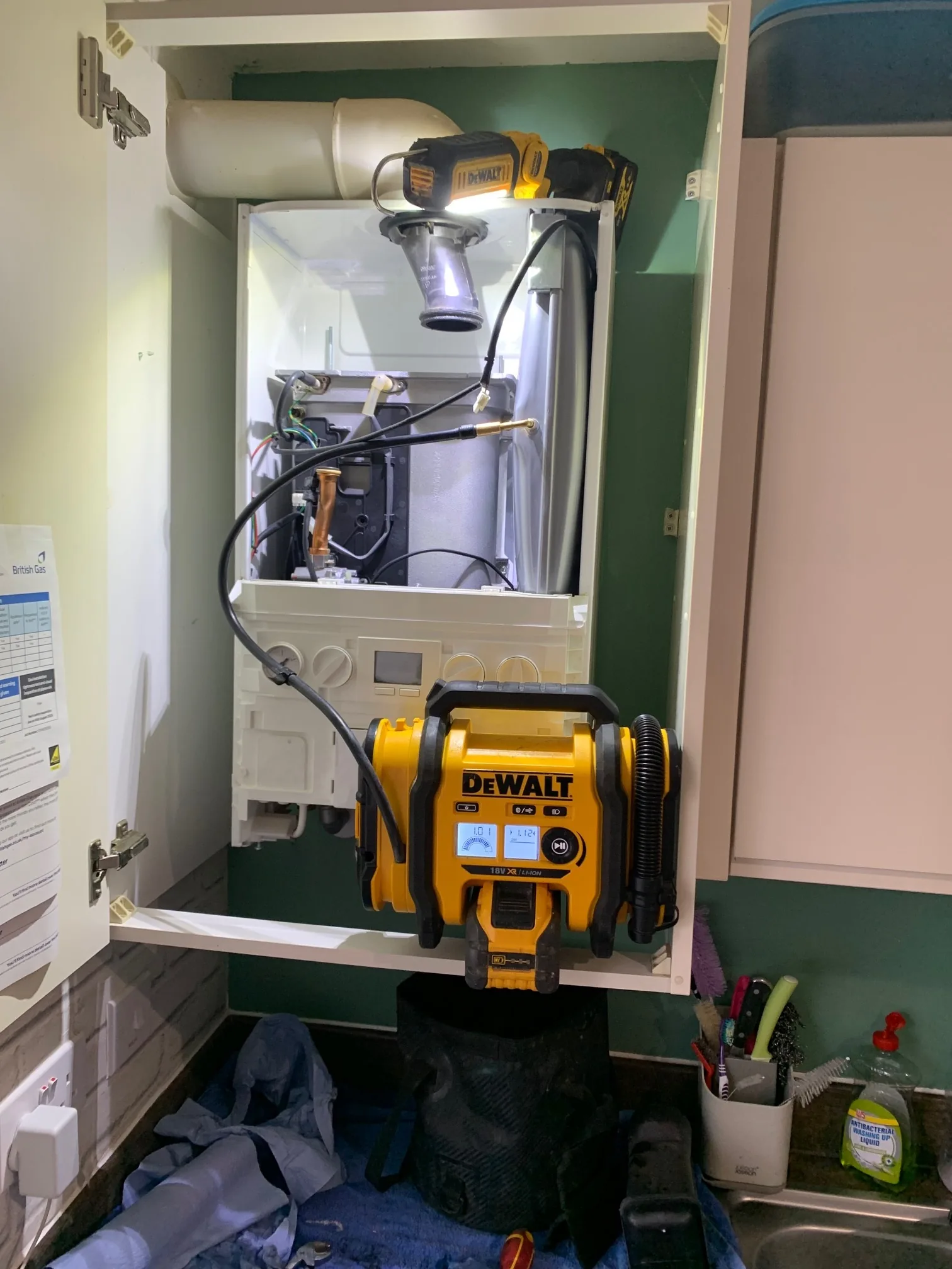 Ideal Logic combi boiler service Attleborough Norfolk with DeWalt vacuum equipment