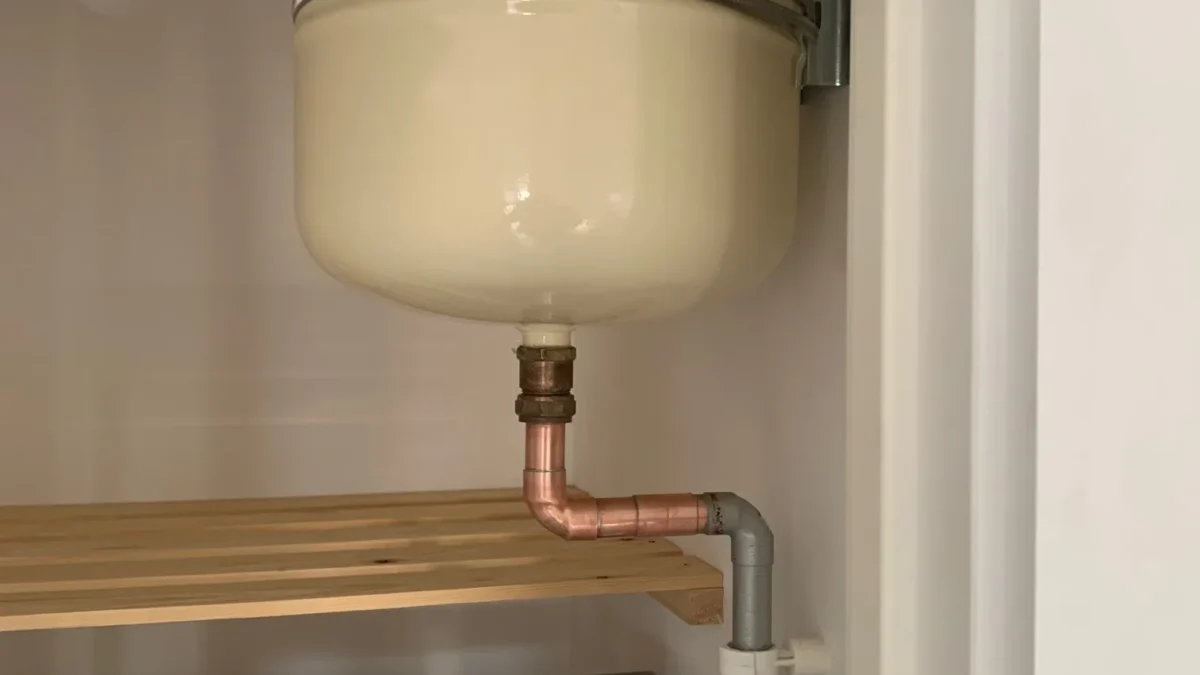 New unvented cylinder expansion vessel installed with bracket in Wymondham