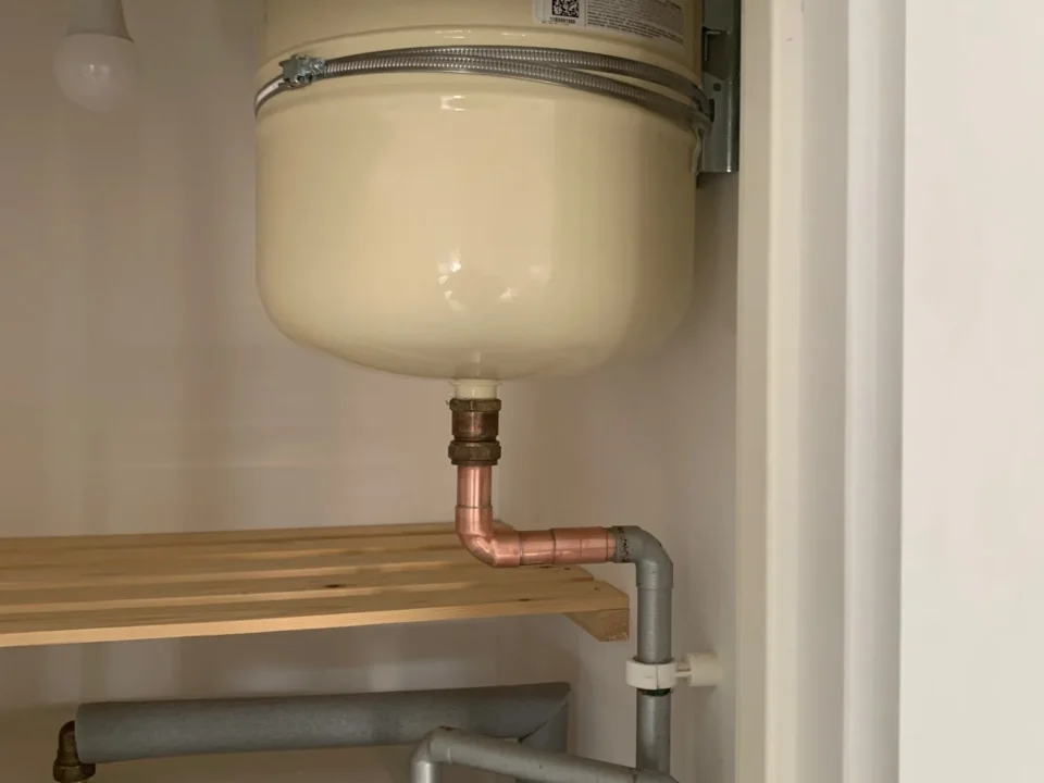 New unvented cylinder expansion vessel installed with bracket in Wymondham
