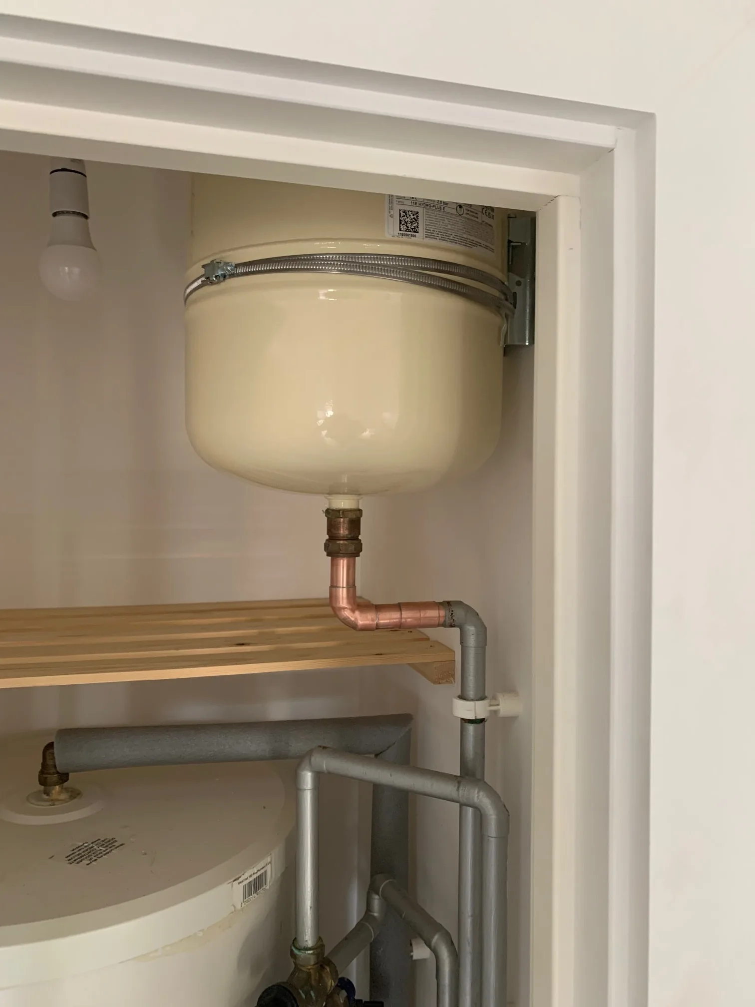 New unvented cylinder expansion vessel installed with bracket in Wymondham