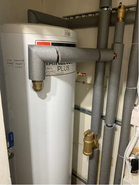 New hot water cylinder installation with insulated pipework Shropham Norfolk